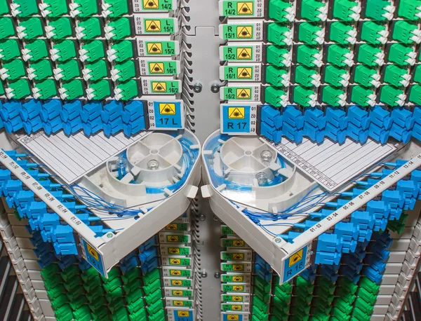 Fiber optic rack with high density of blue and green SC connectors