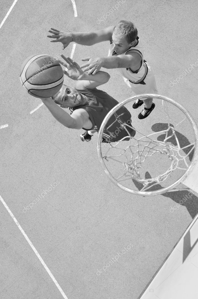 Two basketball players on the court — Stock Photo © cirkoglu #9281915