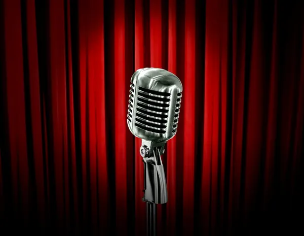 Retro microphone and red curtain