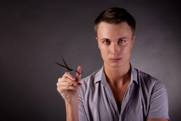 The barber man. Scissors, comb.