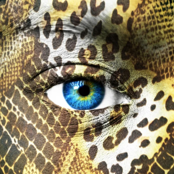Human face with animal patterns