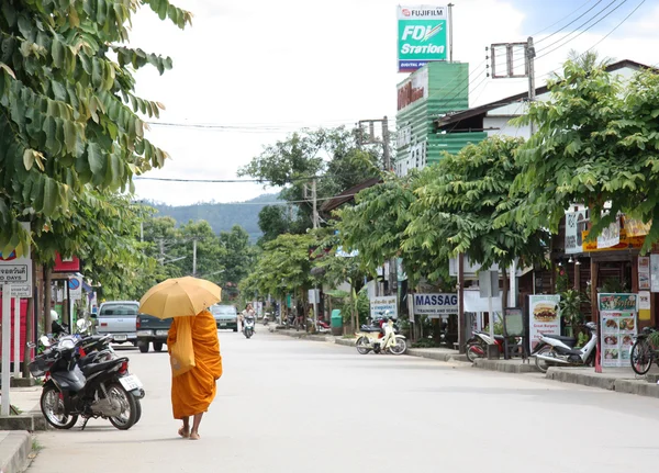 Monk walking in Pai, Thailand