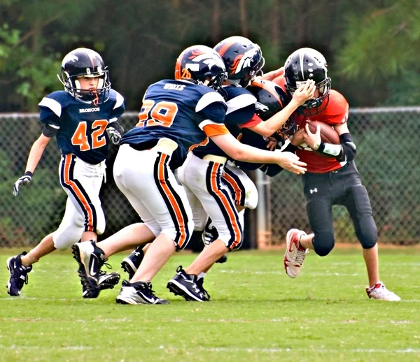 Youth League Football Tackling the Runner