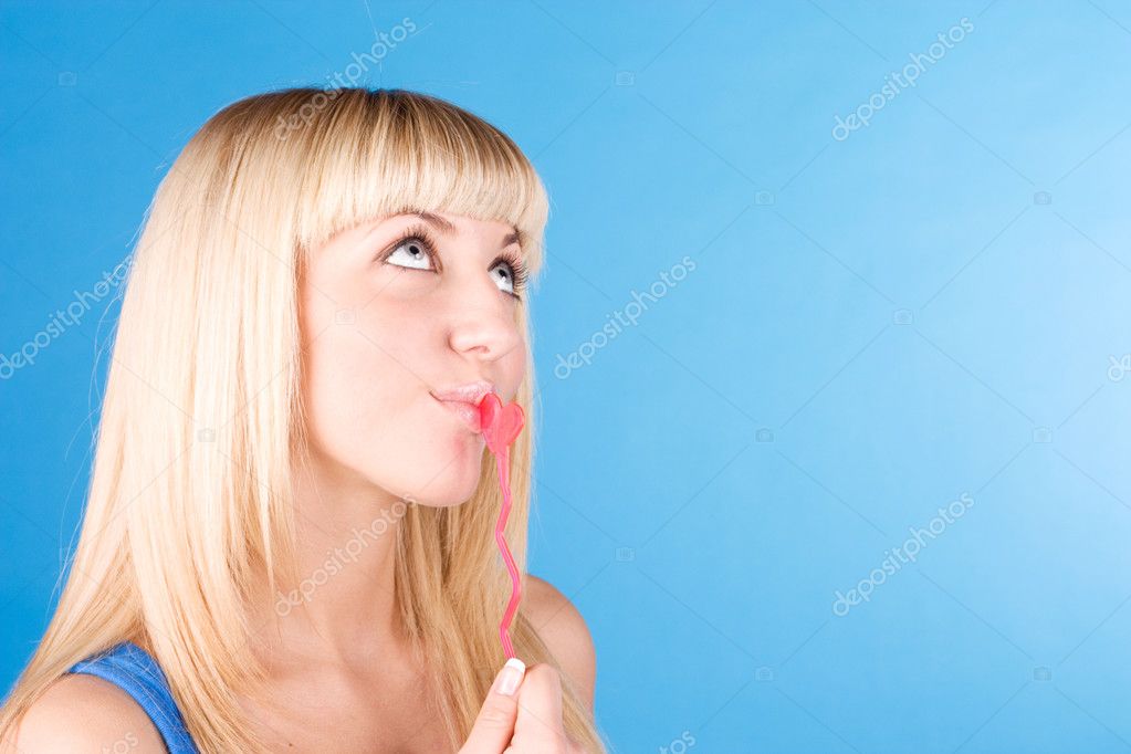 Portrait Of Sexy Blond Woman Sucking Her Candy Love Heart — Stock