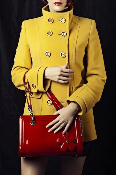 Red bag and fashion yellow coat