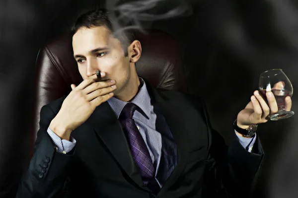 Man with Old Brandy Glass, smoking cigar