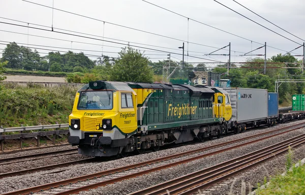 Heavy rail freight loco and containers