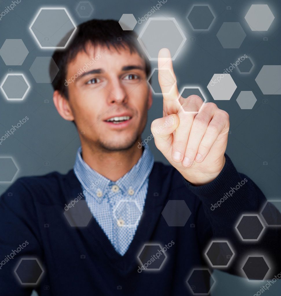 depositphotos_8663638-Business-Man-pressing-digital-button-futuristic-technology.jpg
