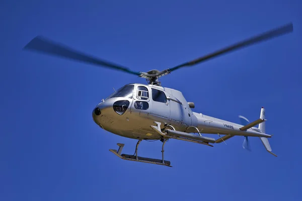 Italy, Sardinia, flying helicopter
