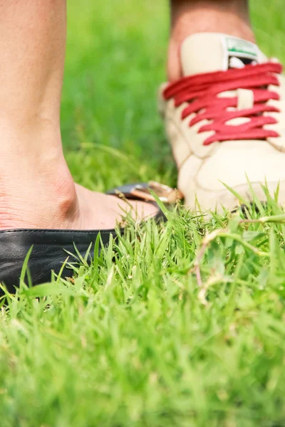 Shoes for men and women on the grass