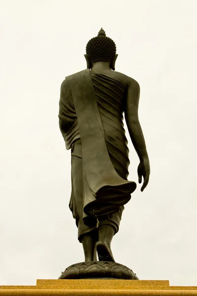 The back of the statue of a white background