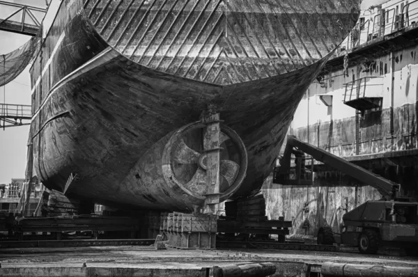 An old ship during hull repair