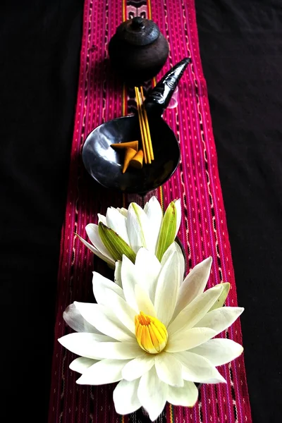 White water lily with Indonesian textile