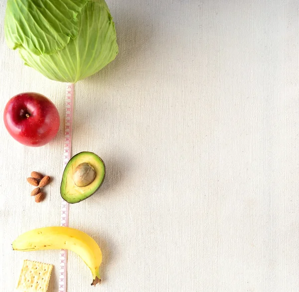 Healthy food with tape measure