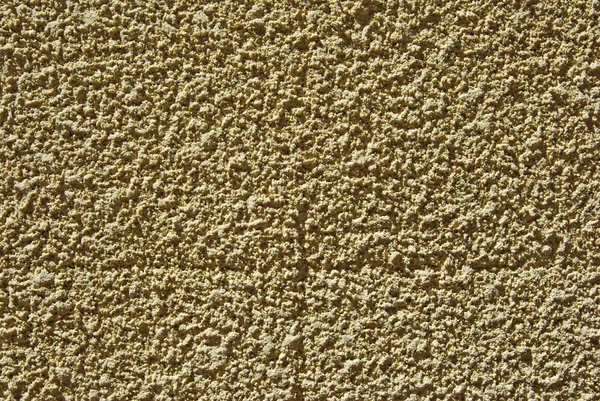 Yellow textured wall. Good as backdrop or background.