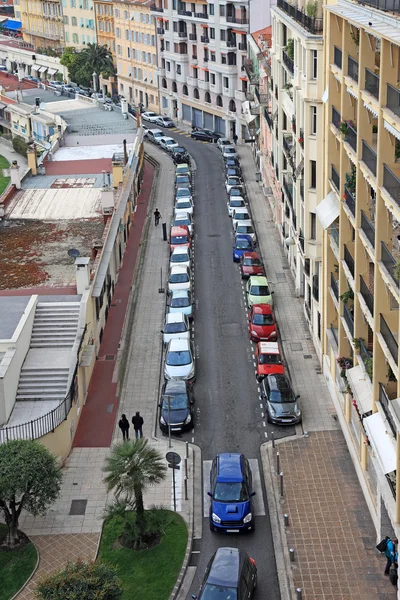 Small street of Nice city with lot of cars.