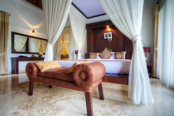Luxury tropical villa bedroom, Bali, Indonesia.