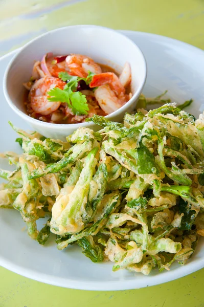 Deep fried morning glory with spicy shrimp salad
