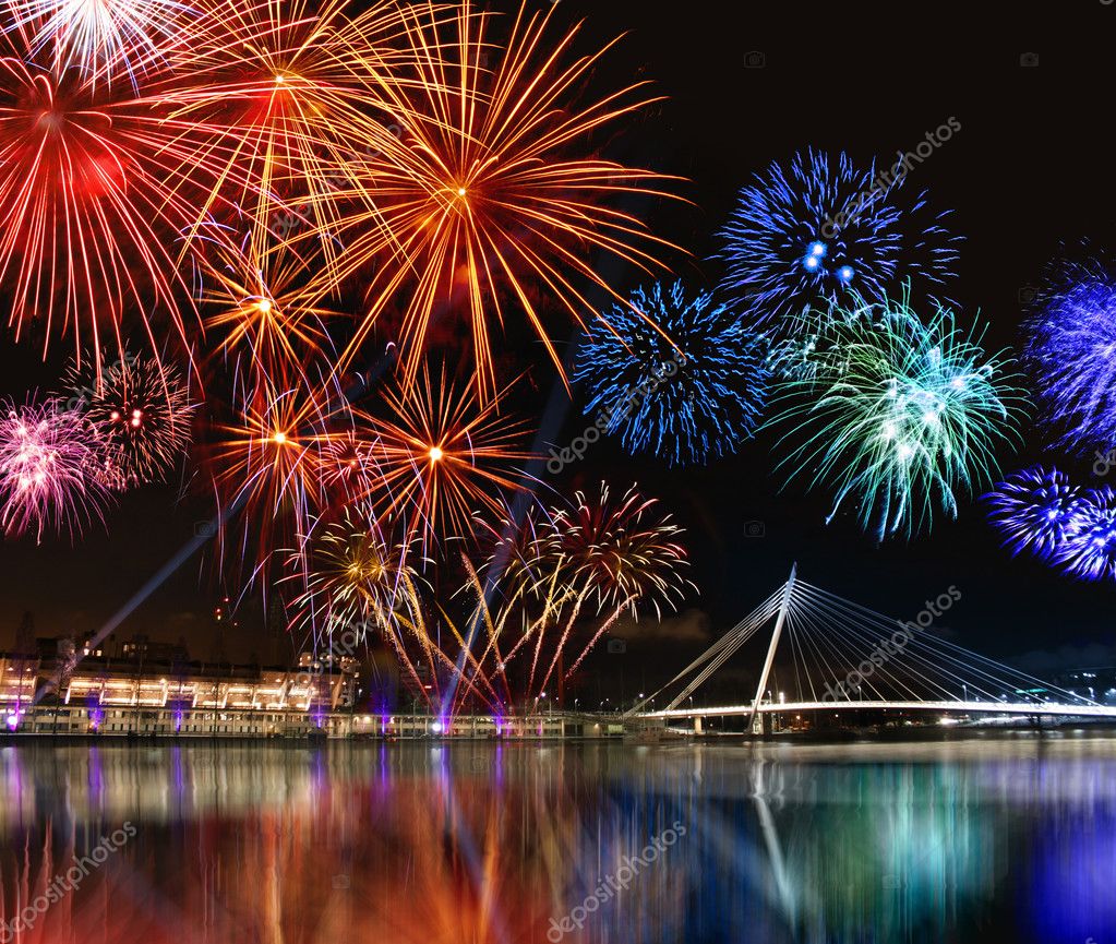 Colorful fireworks near water — Stock Photo © anterovium #9399579