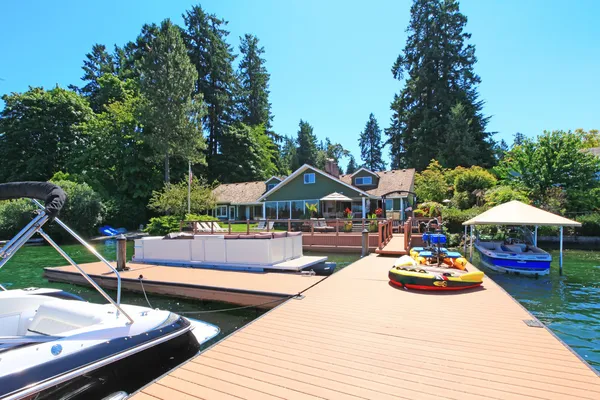 Beautiful lake waterfront property with dock and very large deck.