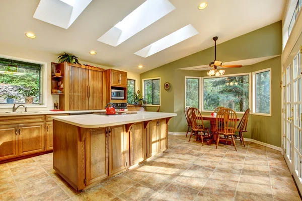 Large country kitchen with skylights.
