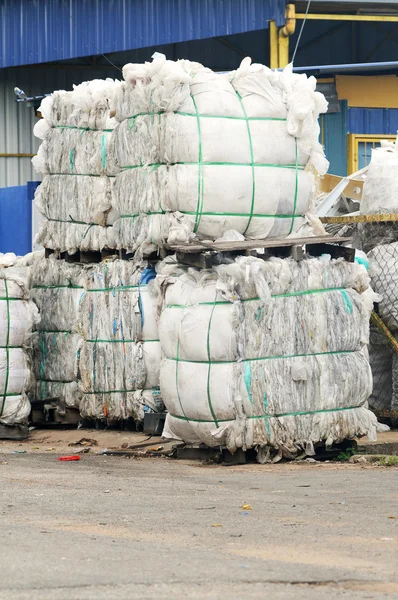 Stack of paper waste at recycling plant
