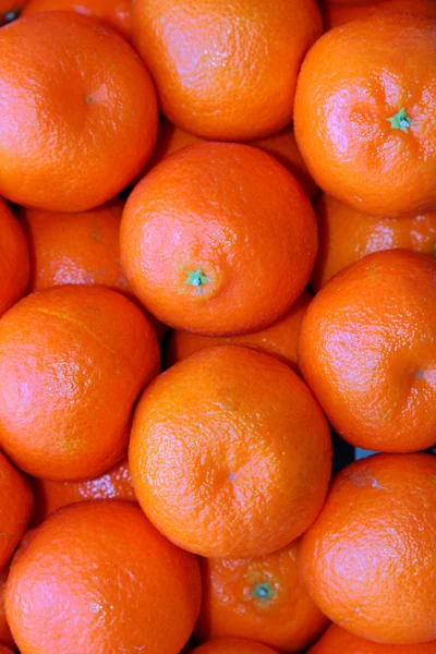 Tangerine oranges in a crate fresh fruit stock