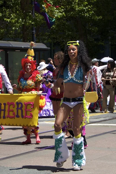 Transvestite at Gay Pride In Colorful Costume