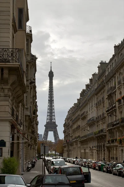 Street with a view to Eiffel Tower