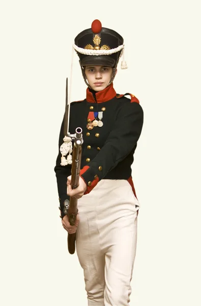 Boy in uniform of soldier in XIX century