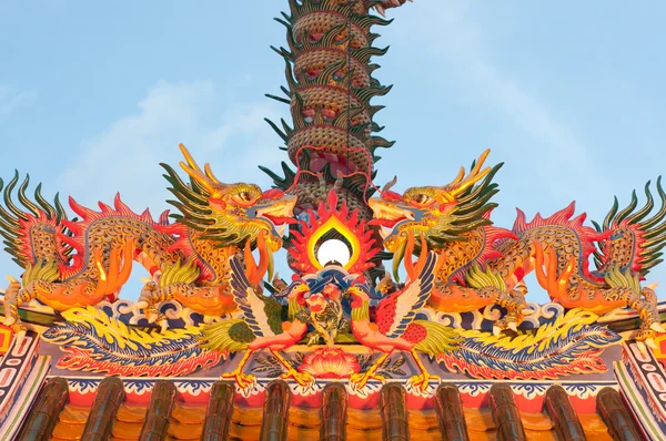 Happy Chinese new year - chinese temple roof with dragon