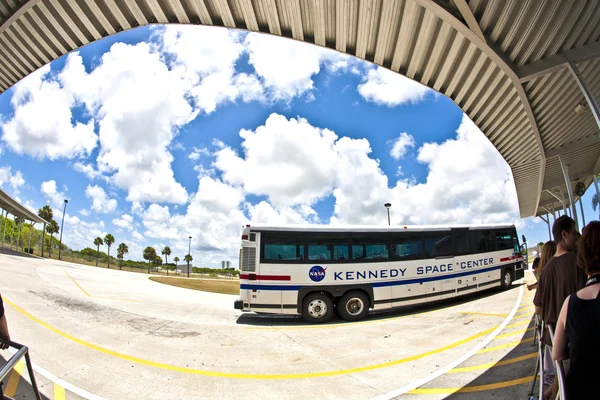 Visitors travel by bus in the Kennedy space center