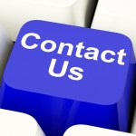 Contact Us Computer Key In Blue For Helpdesk Or Assistance - Stock Photo