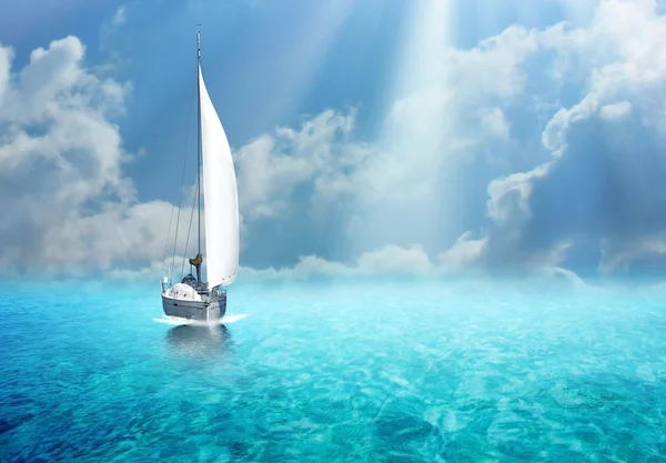 Sailing boat in the ocean
