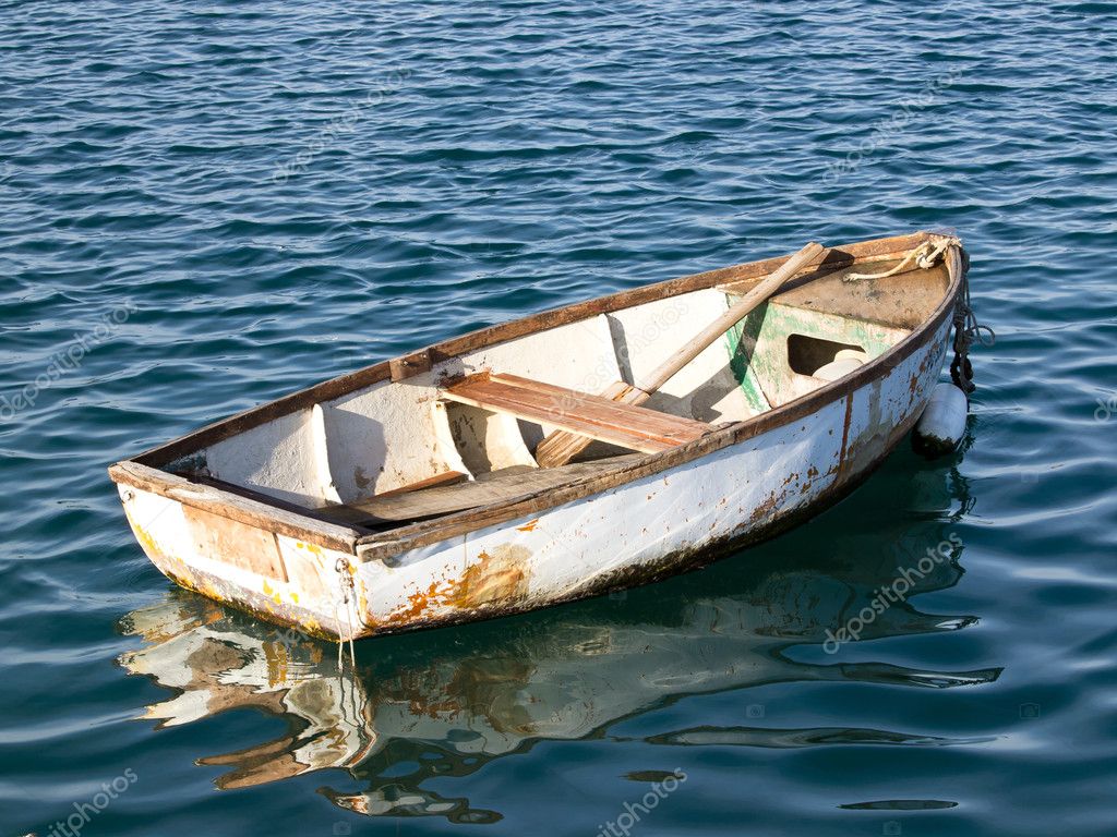 Old Wooden Boats Old wooden boat on the sea