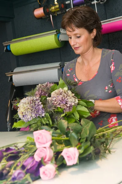 Florist working in a store