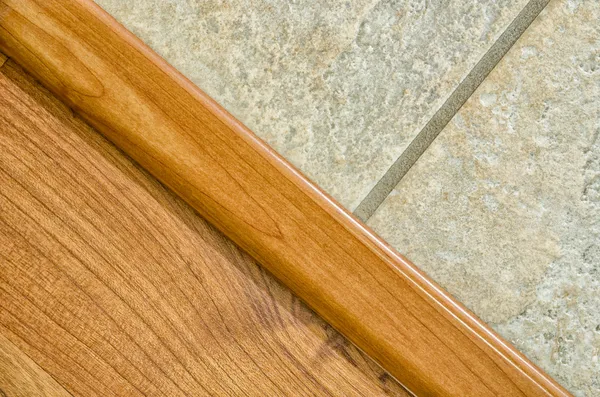 Wooden and tile floor