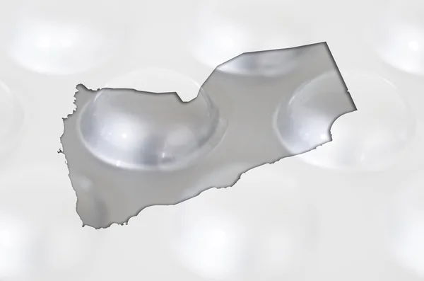 Outline map of yemen with pills in the background for health and