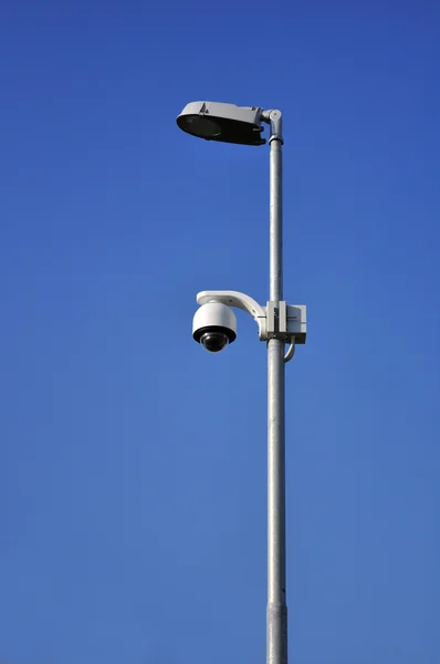 Surveillance camera on street lamp