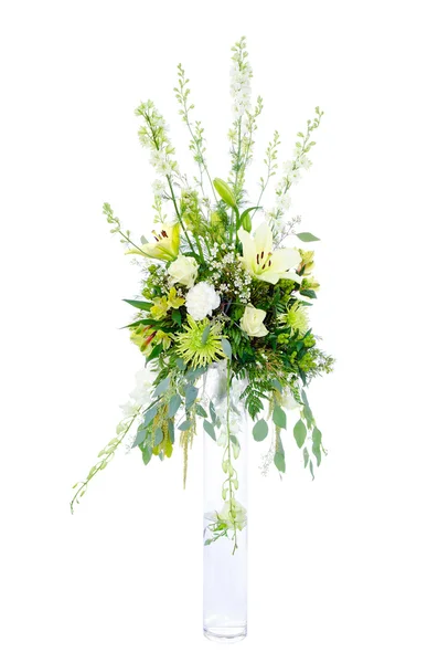 Large wedding flower arrangement with roses, lilly, mum, spider chrysanthemum and carnation isolated on white