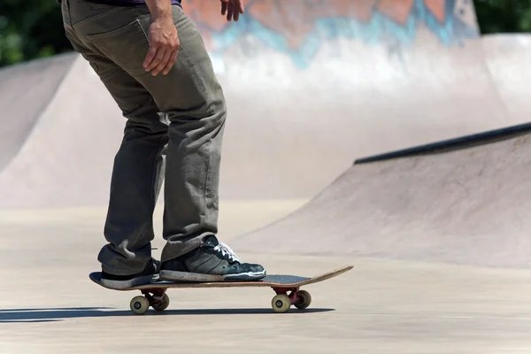 Skateboarder on the Concrete Skate Park