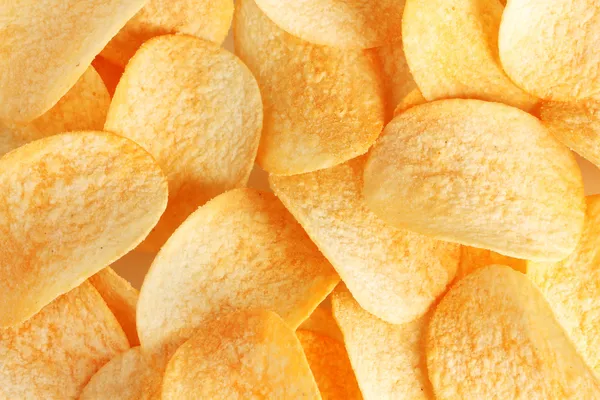 Delicious potato chips closeup