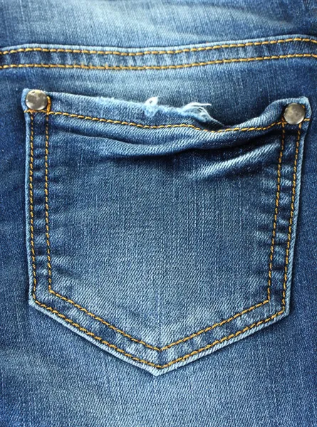 Blue jeans pocket closeup