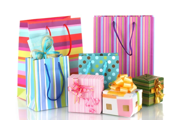 Bright gift bags and gifts isolated on white — Stock Photo #9702840