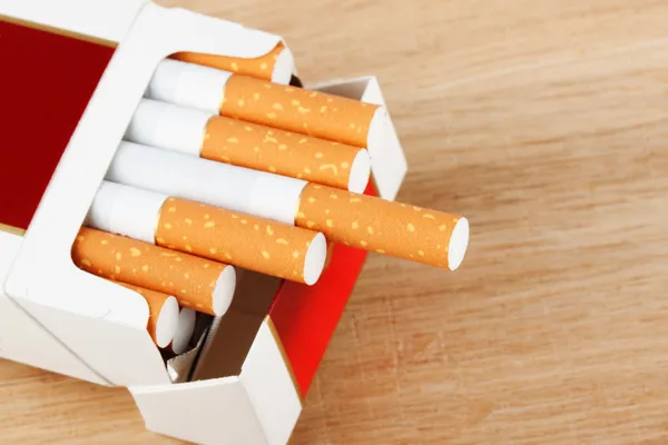 Cigarettes in pack on the breadboard