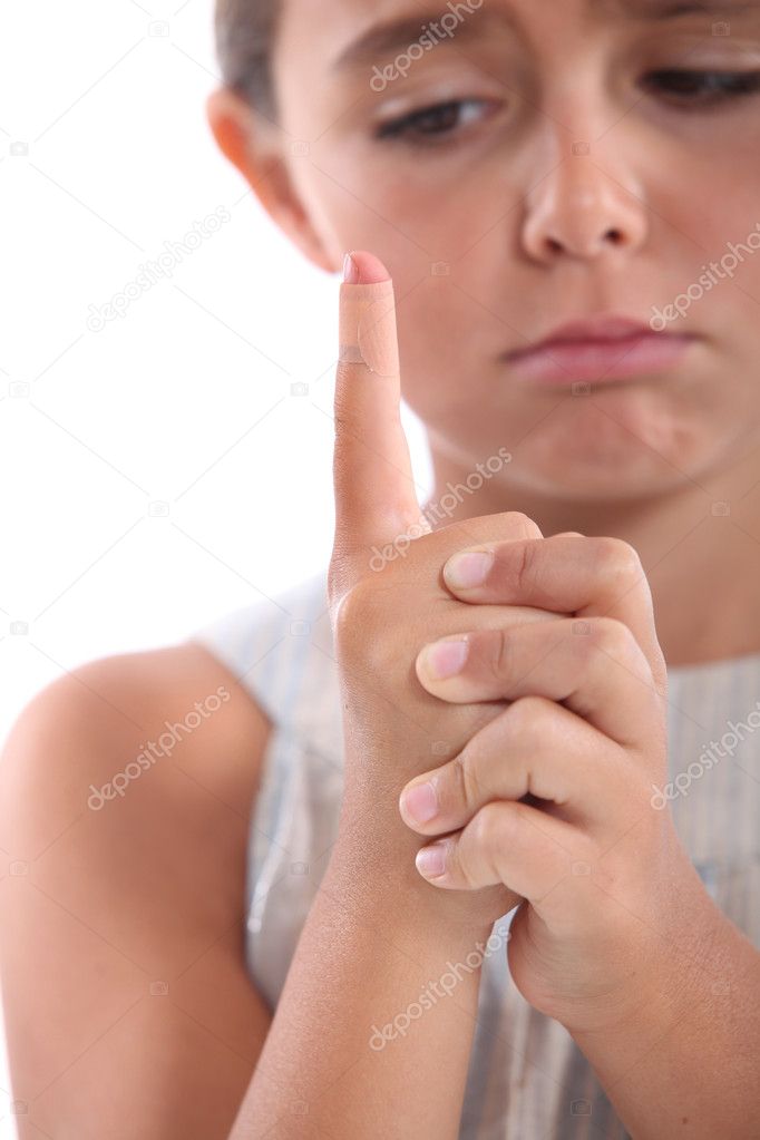 Little girl with hurt finger — Stock Photo © photography33 10473513