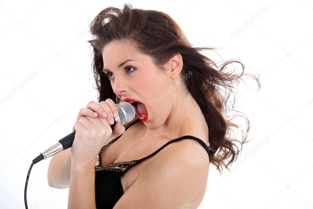 depositphotos_-stock-photo-woman-singing-loudly-into-a