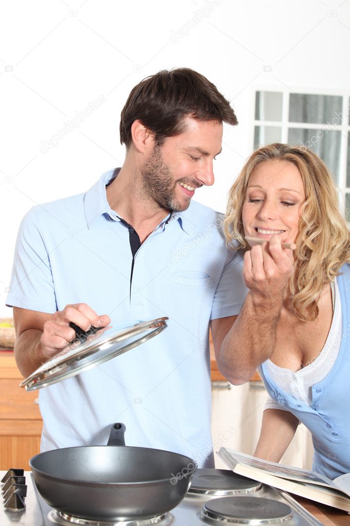 loving-husband-cooking-and-his-wife-working-stock-photo-image-of