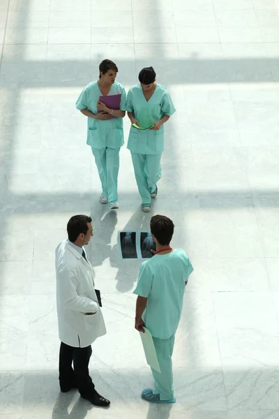 Hospital staff in corridor