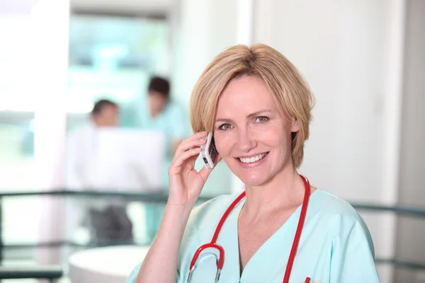 Nurse on mobile phone